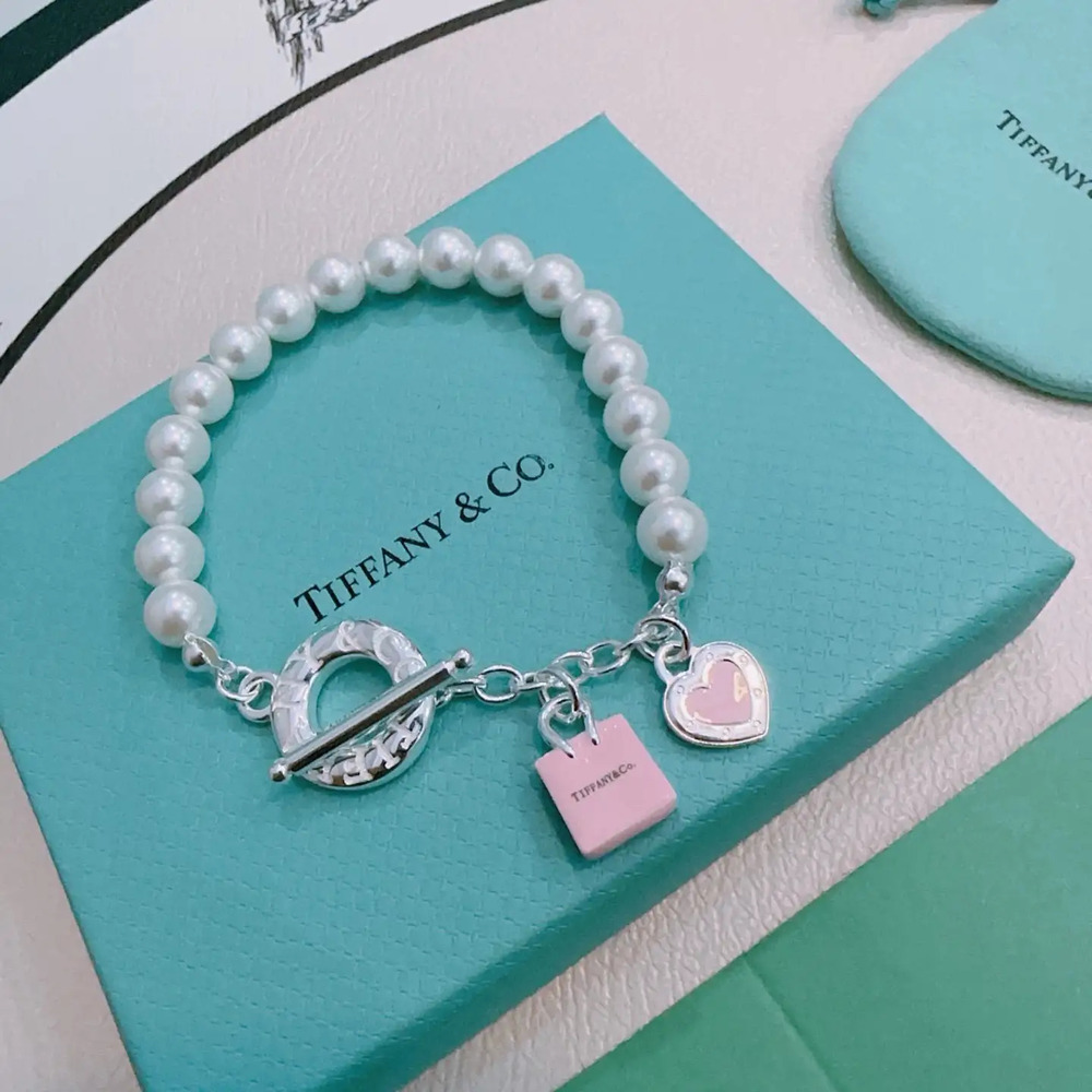 Tiffany & Co. pink and silver color scheme with heart-shaped beads Bracelet